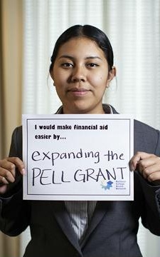 College student holding a sign to advocate for expanding the Pell Grant