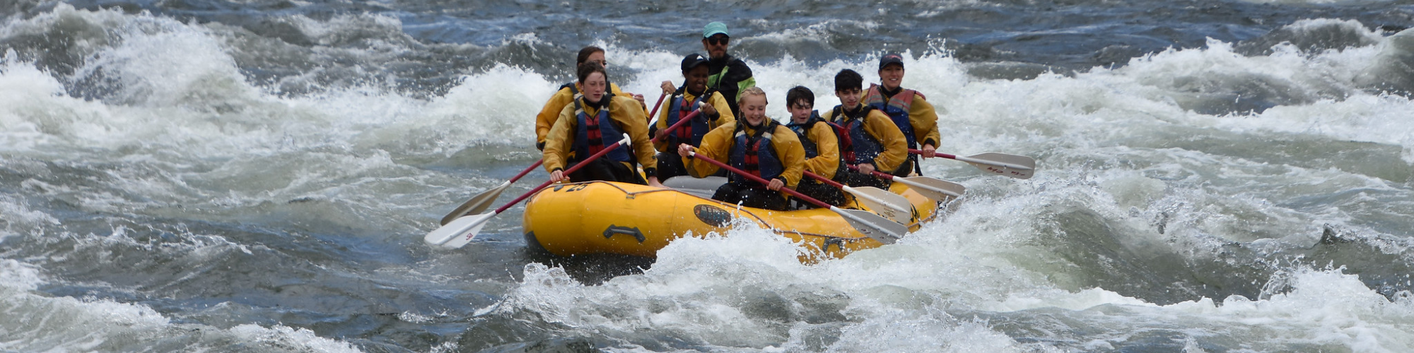 students whitewater rafting