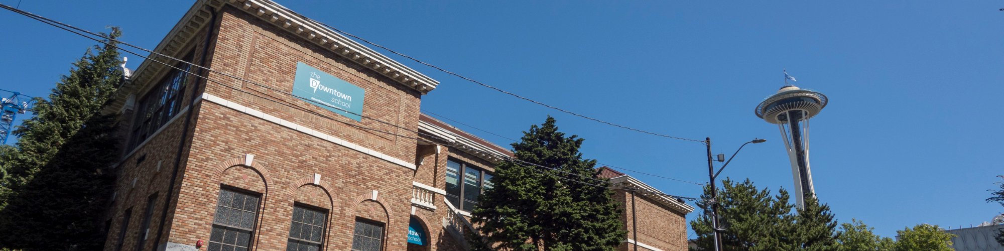 school building next to space needle