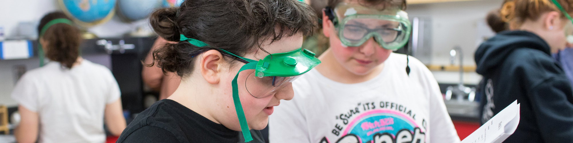 goggled students in science lab