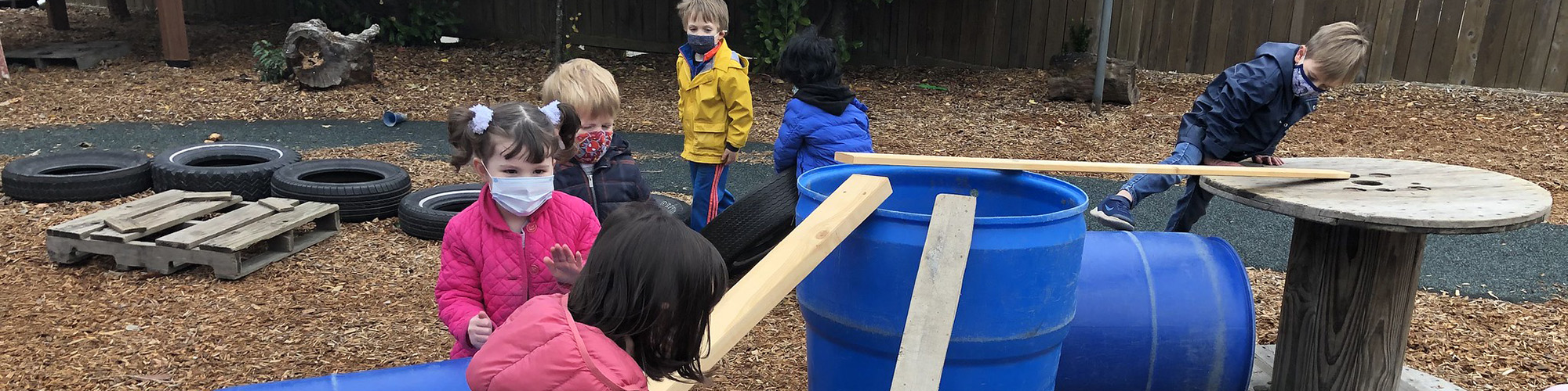 young students playing in a makeshift playground