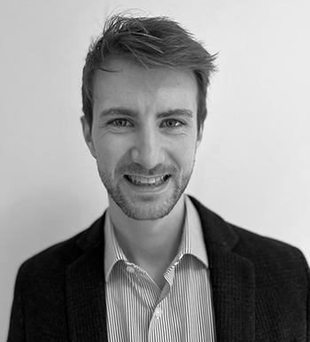 black and white headshot of Christopher