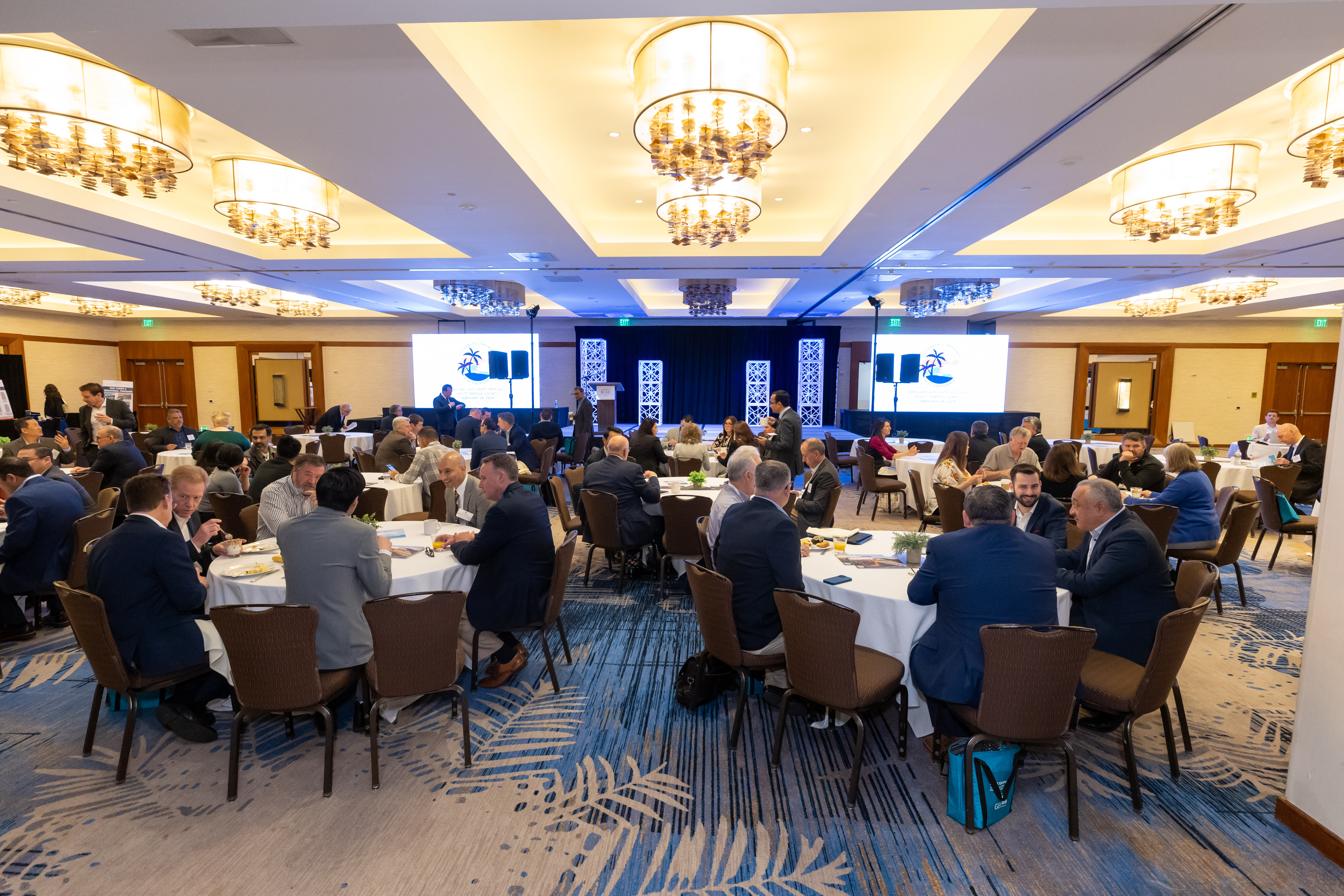 Annual Conference Attendees at Tables