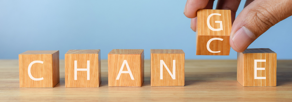 Photo of wooden blocks with the letters C H A N G E on them