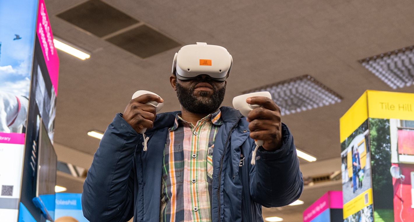 Man wearing VR headset in Digital Spaces 