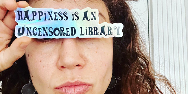 Face of Jennie Rose Halperin masked by banner saying Happiness is an uncensored library