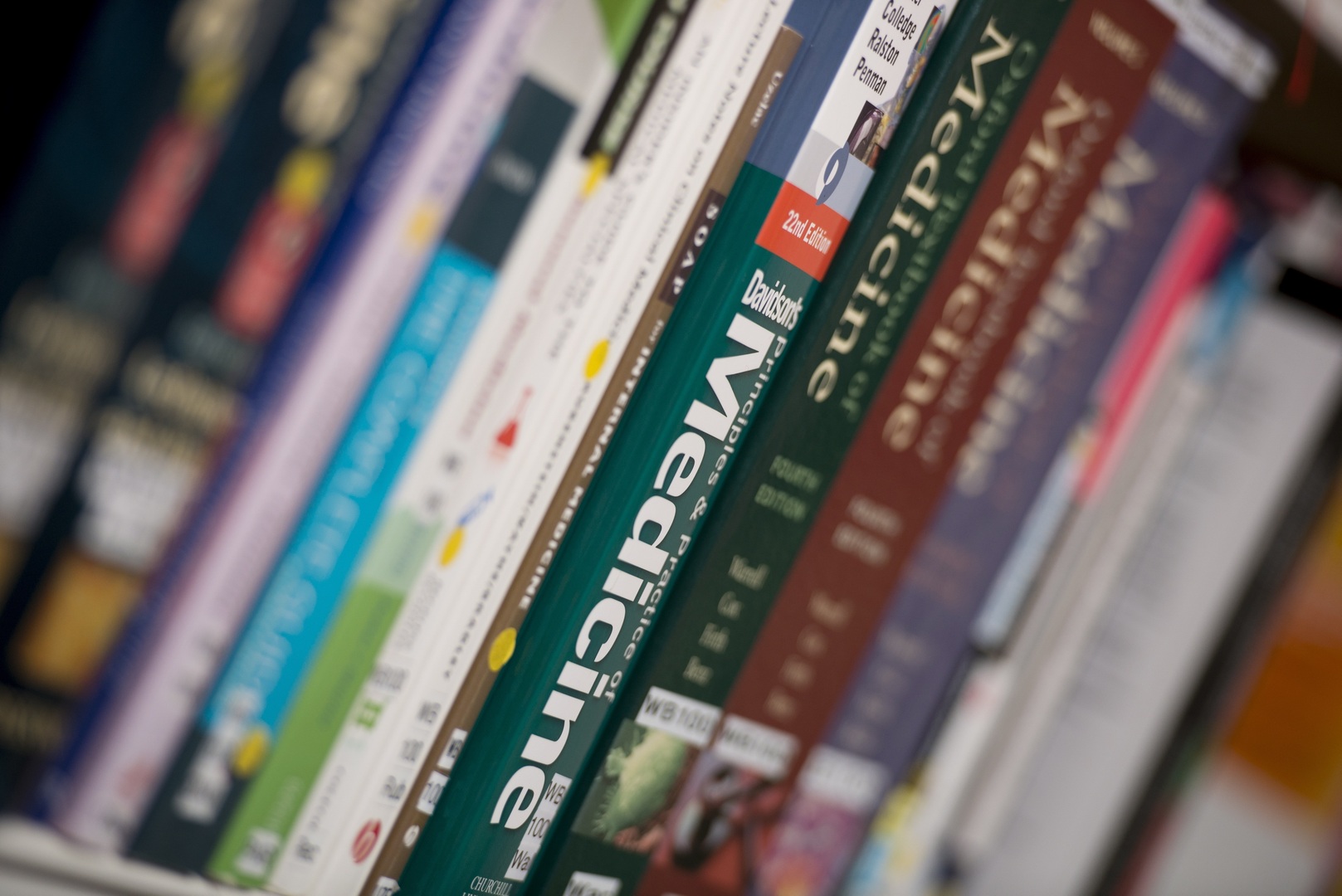 stock image of books on a shelf