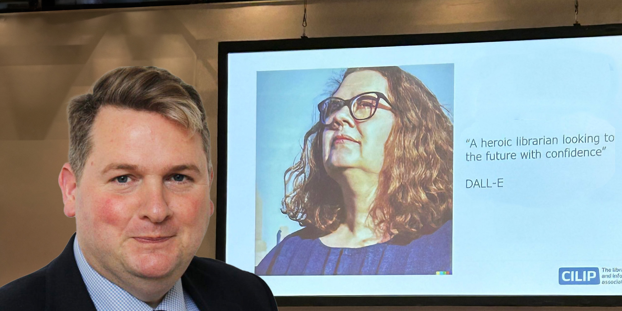 Photo of a nick poole in front of a PPT presentation 