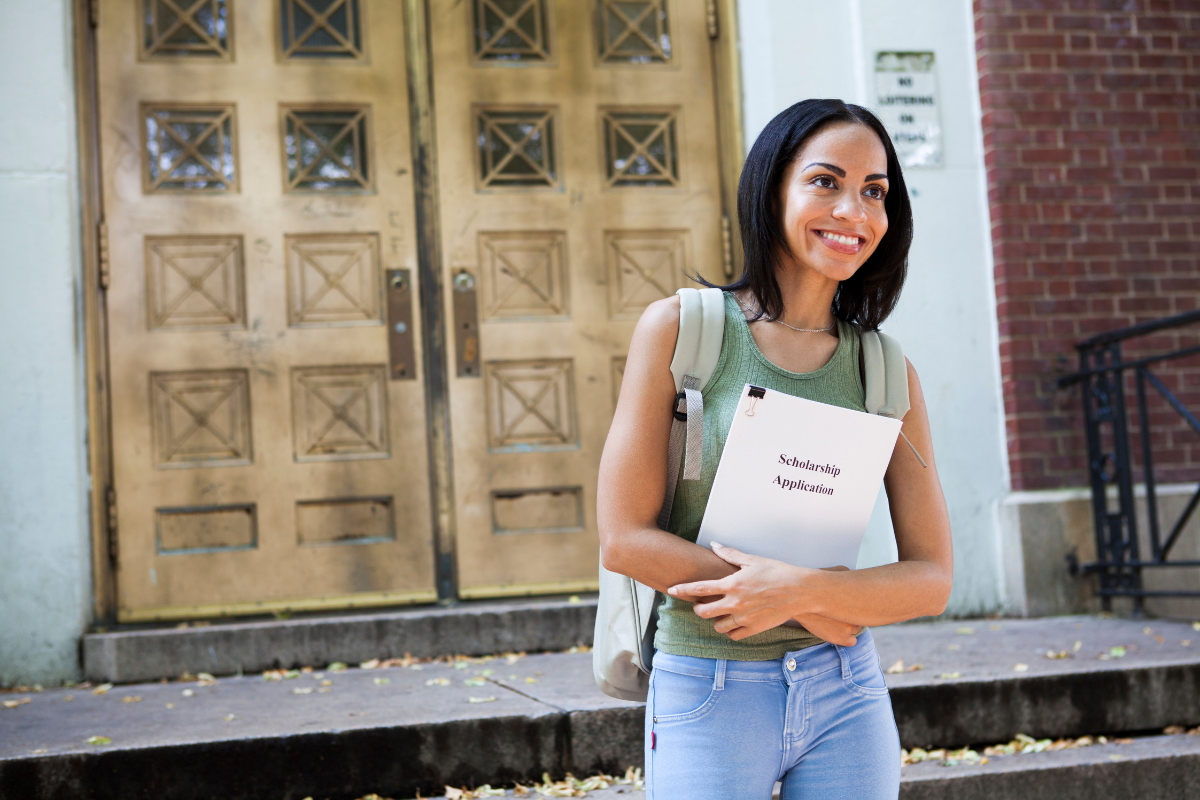 A female student walking out of a building