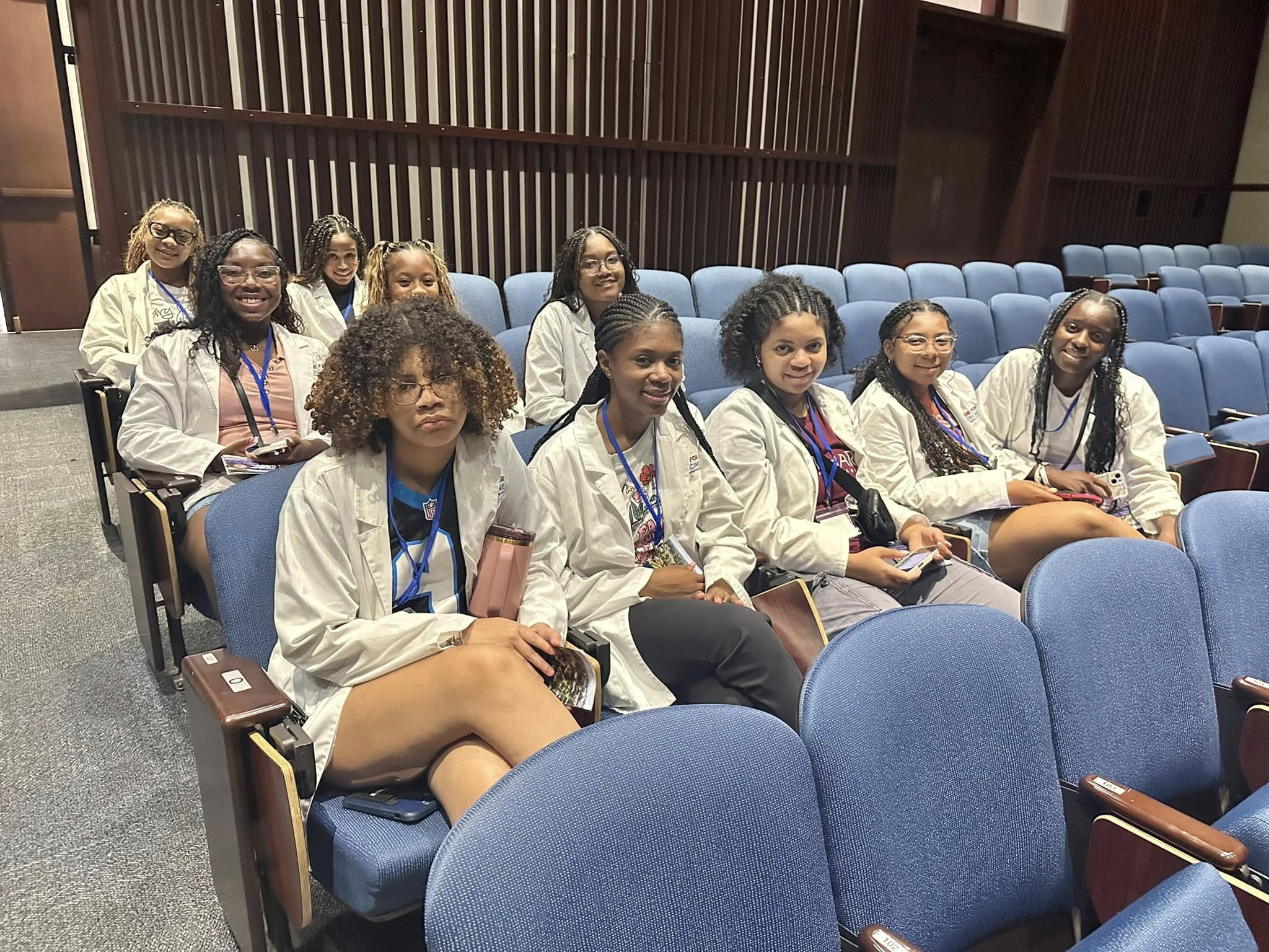 Students sitting in auditorium