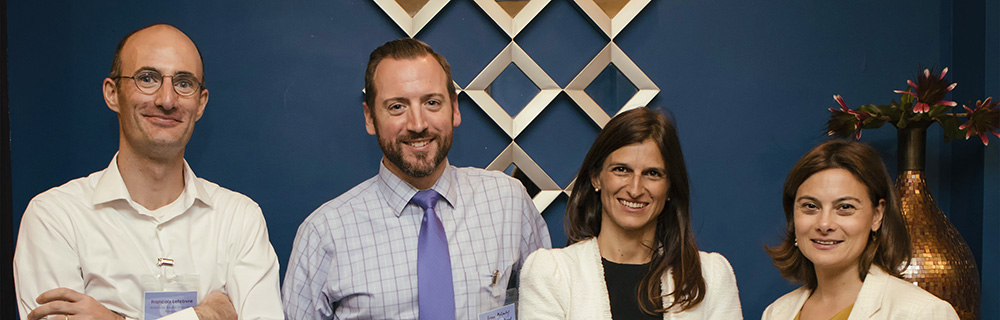 Mixed group of four people who are EBRD Alumni