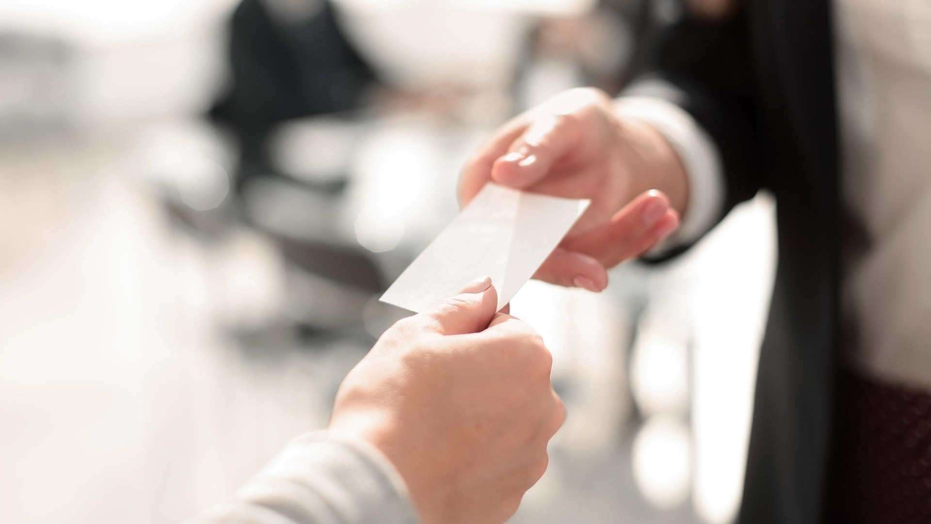 Handing a Business Card to Someone