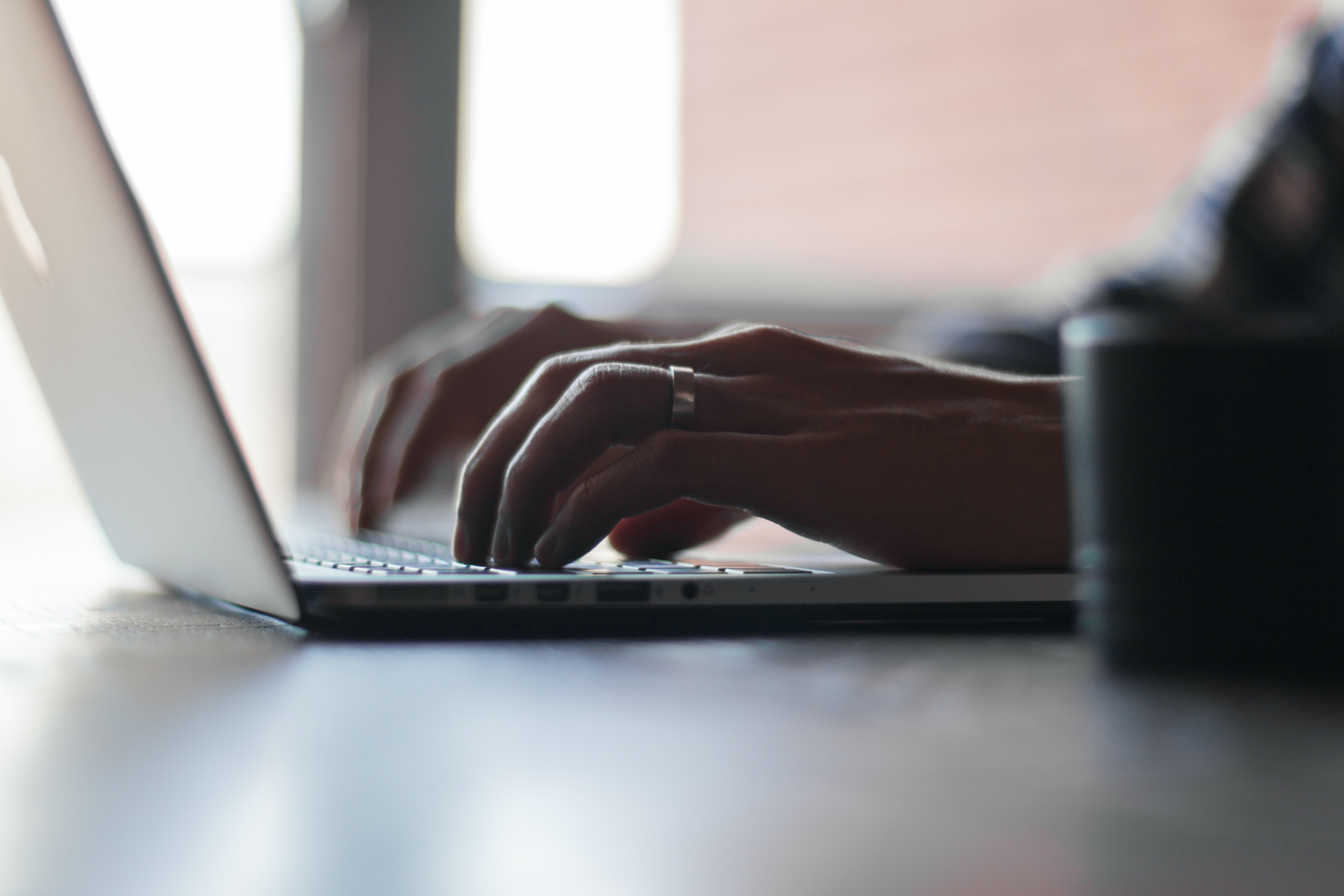 typing on a laptop
