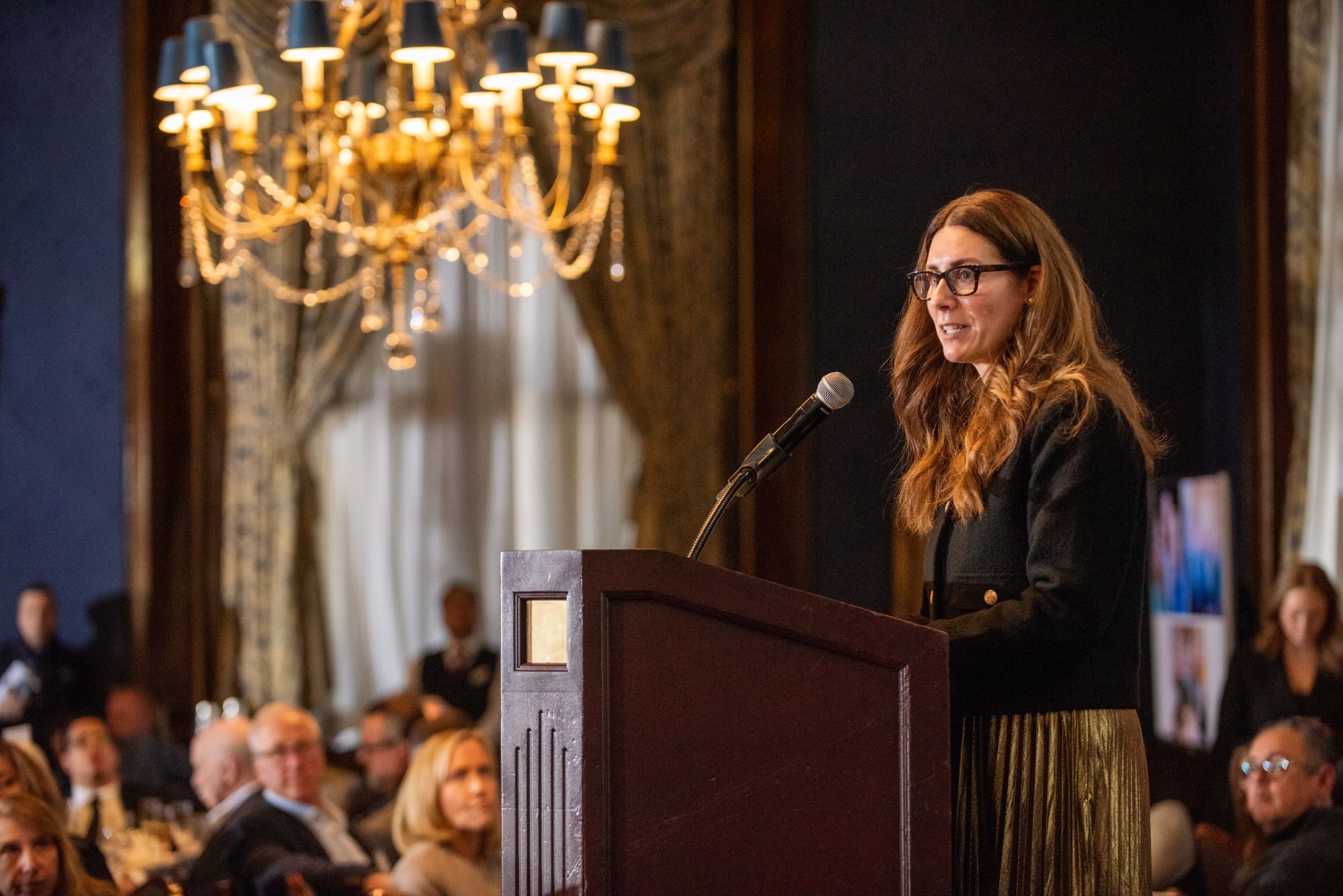 Liz Lombardo Stark speaking at the Annual Meeting