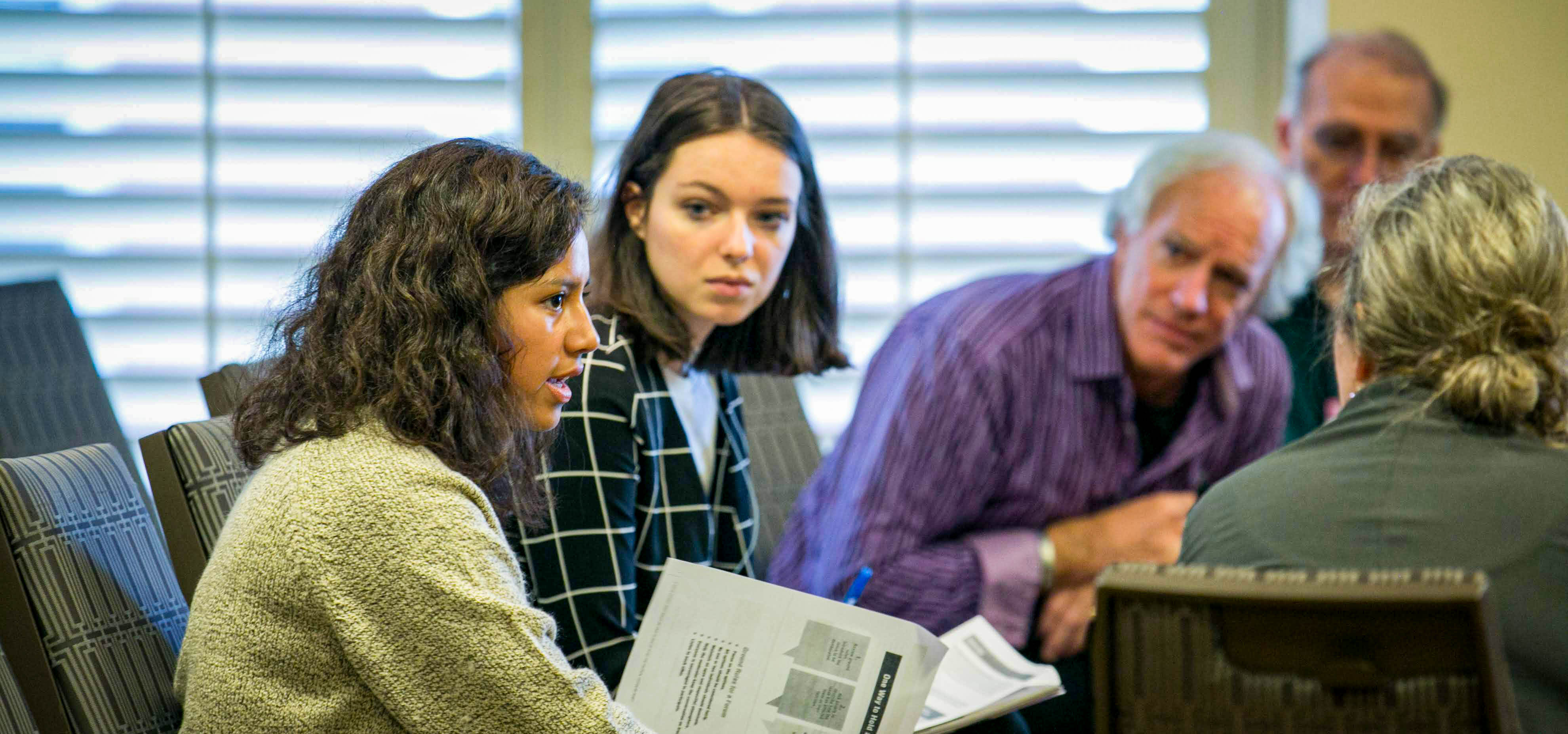 Mixed group discussion at a workshop or meeting.