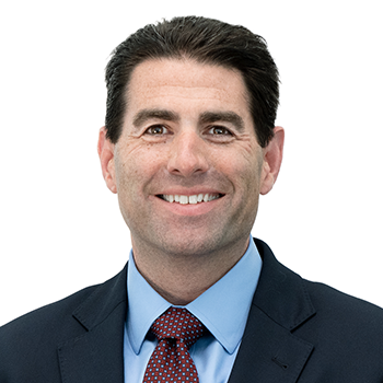 Portrait of a smiling man in a suit and tie
