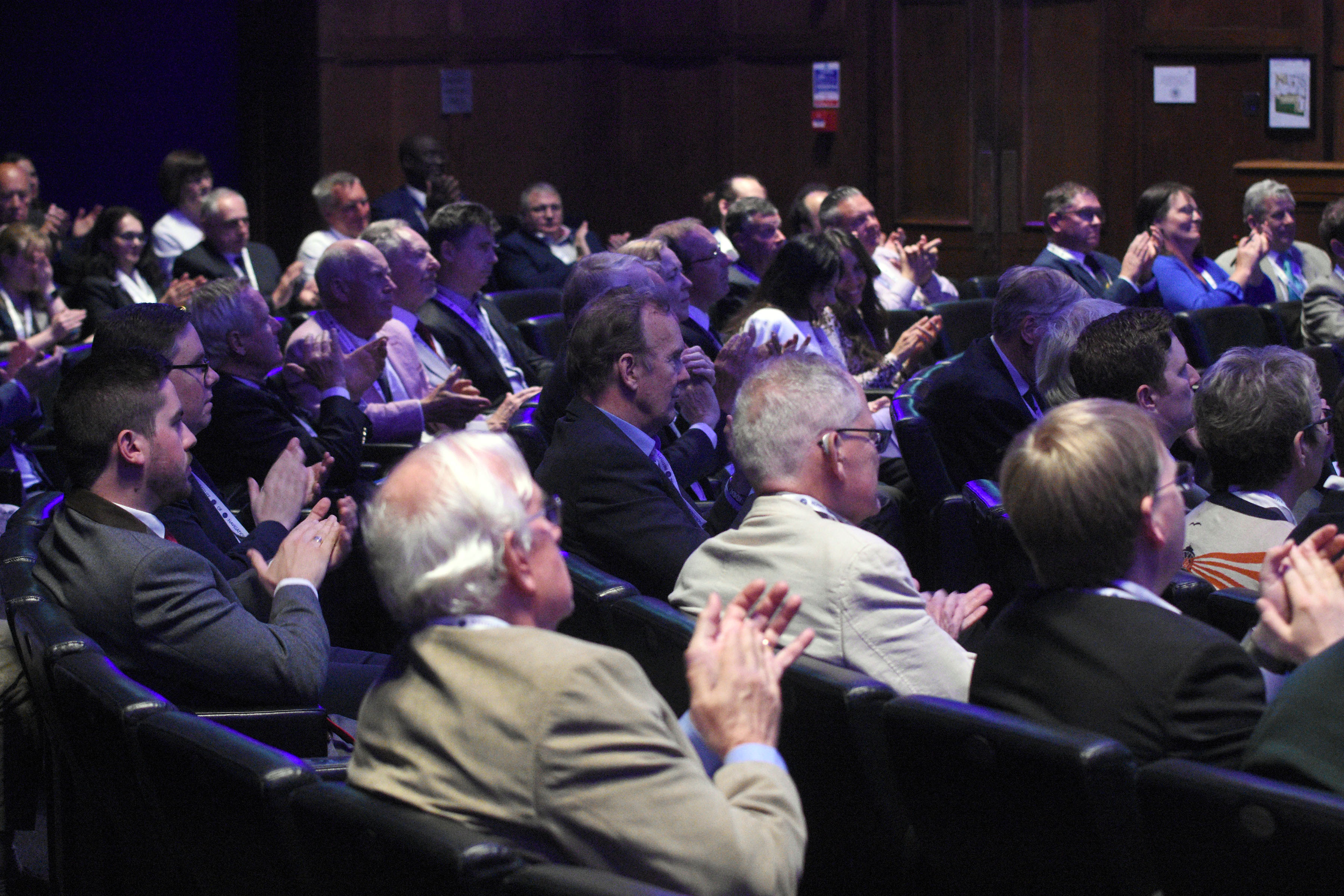 photo of AGM crowd applauding