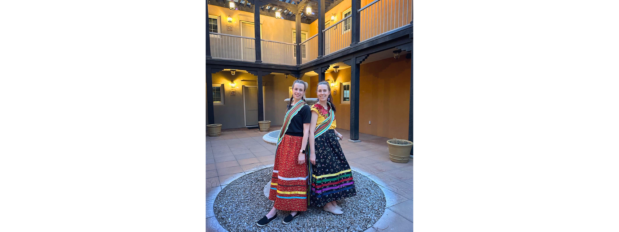 Marina and her sister, Montana, posing for a photo after both receiving a Mental Wellness and Harm Reduction Sash at a Métis health and wellness gathering