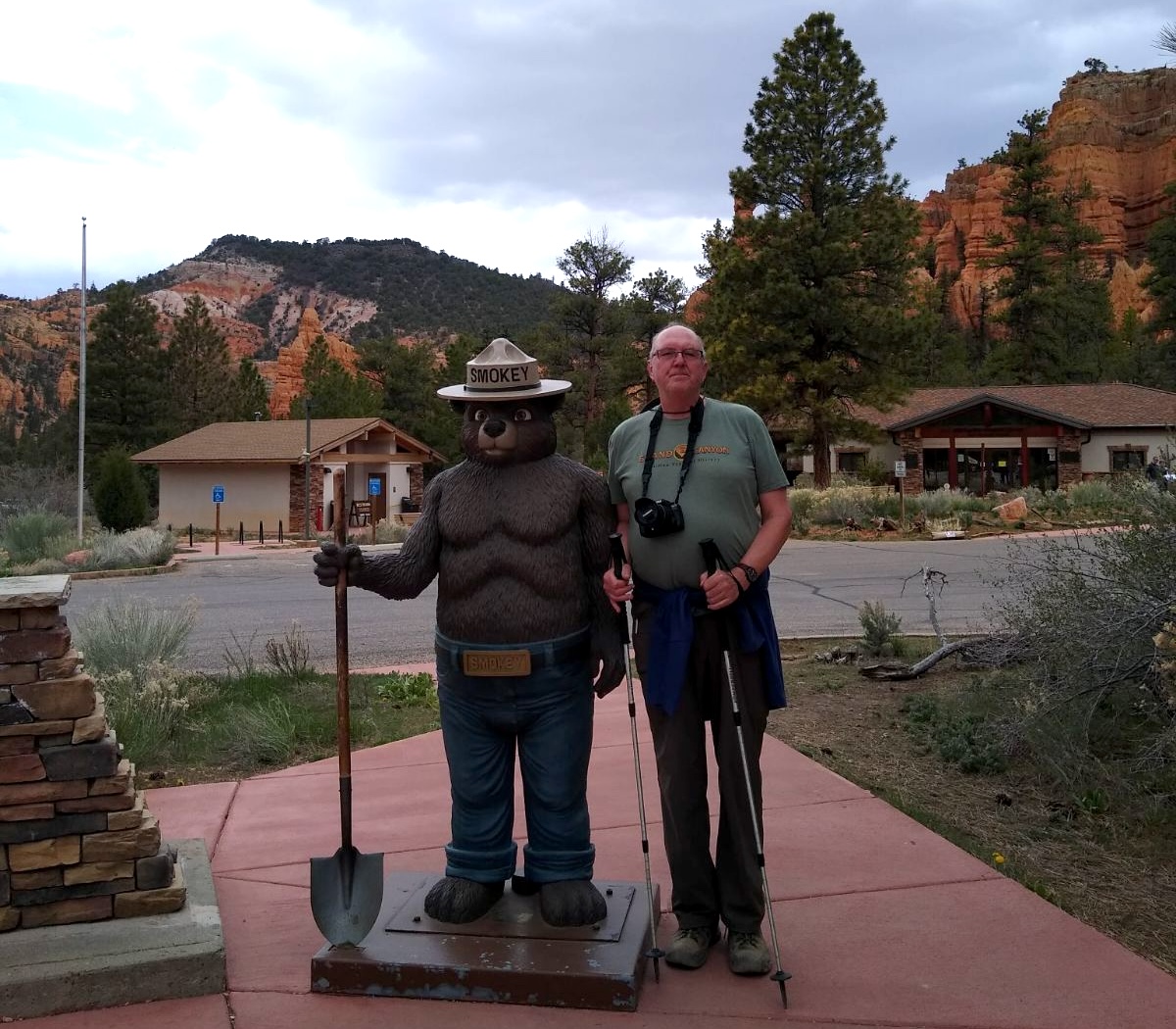 Mike Toohill beside Smokey the Bear