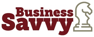 Burgundy text that says, Business Savvy, to the left of beige graphic of horse chess piece